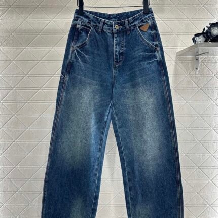 Spliced leather curved knife denim pants